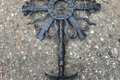 27.-Kalviskas-metalinis-kryzius-saulute